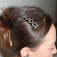 Gucci Black Diamond Logo Hair Clip